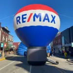 Colorful branded balloon inflatable attracting attention outdoors