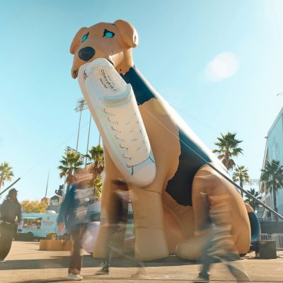 Converse dog inflatable holding show for brand activation launch
